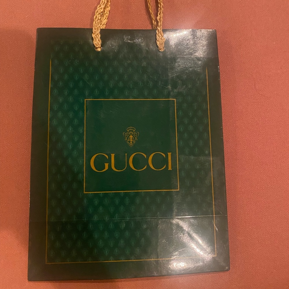 Gucci gift bag. No holes. Non smoking home